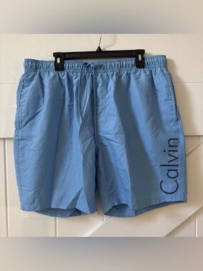 Calvin Klein Mens Swimwear Swimsuit Trunks Blue Size XXL 7” Inseam Lined Pockets